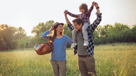 A family enjoying in greenary